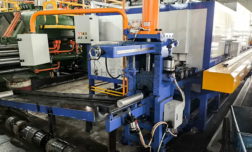 Large heavy-duty aluminum extrusion press machine operating in the Shenghai Aluminum manufacturing facility.