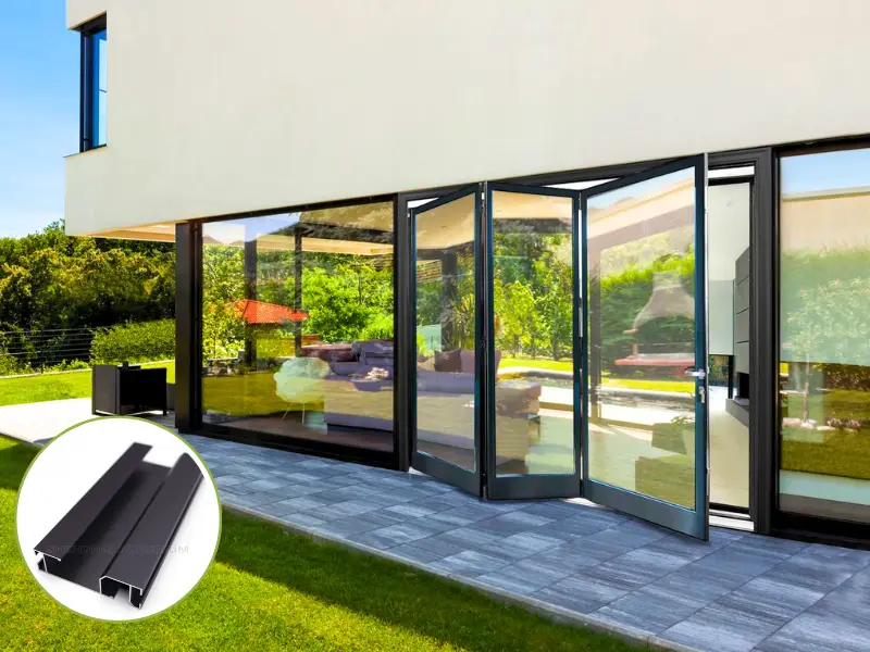 Modern black anodized aluminum folding doors in a luxury Riyadh villa.