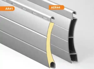 Comparison between AR41 foam-filled insulated slat and AER44 double-walled hollow extruded aluminum roller shutter profile.